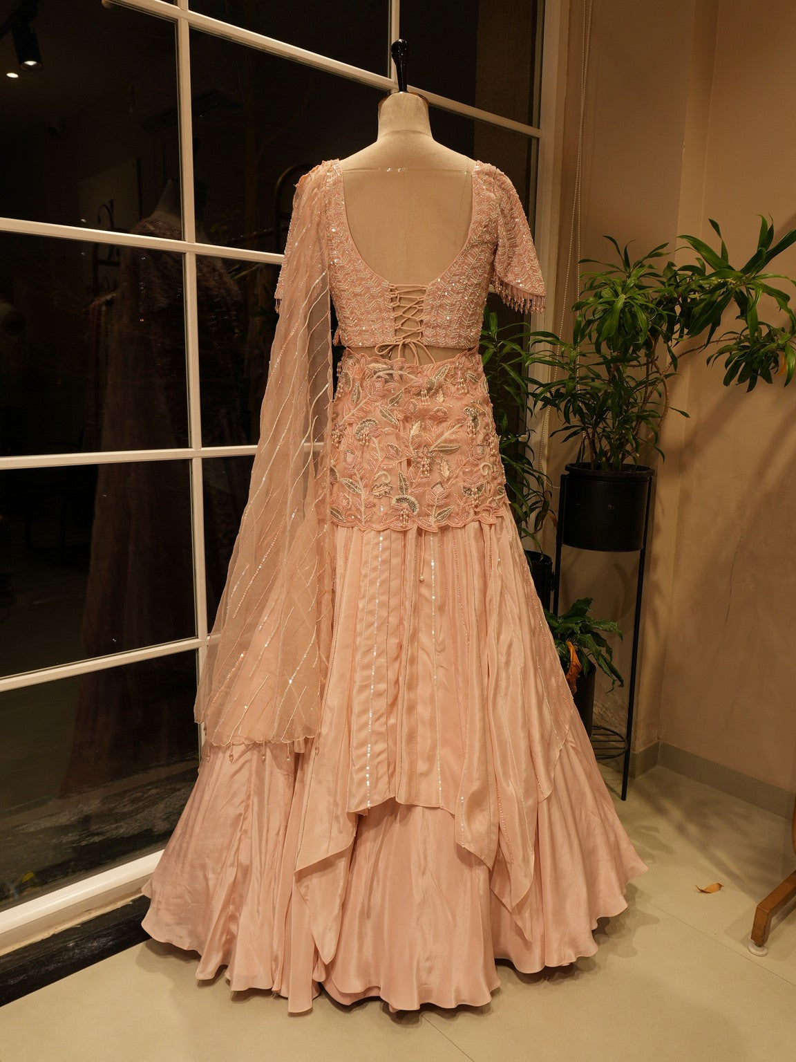 Pastel peach drape lehenga set
