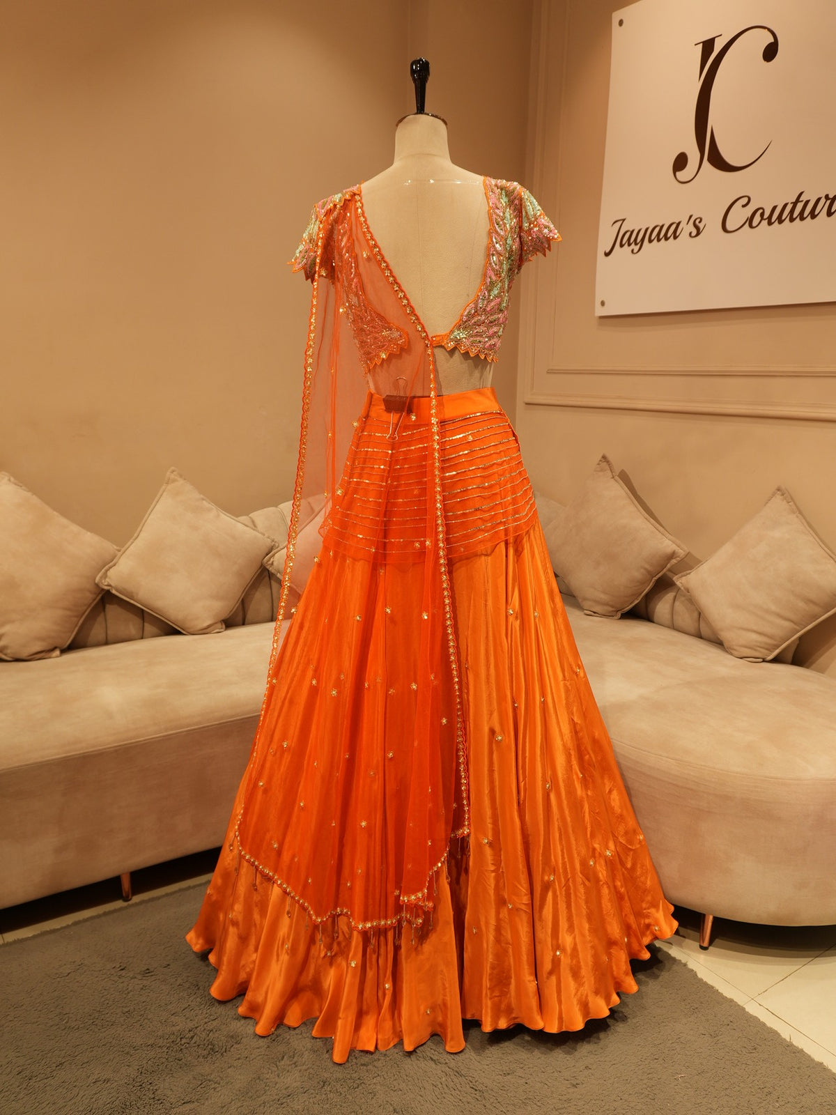 Rust orange embroidered drape lehenga set