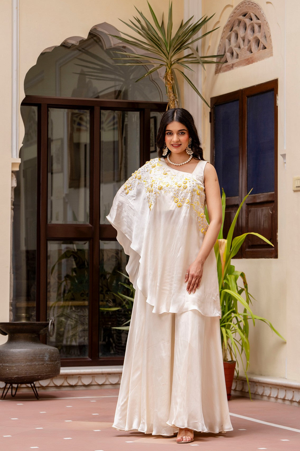 Pearl white top with falired plazo