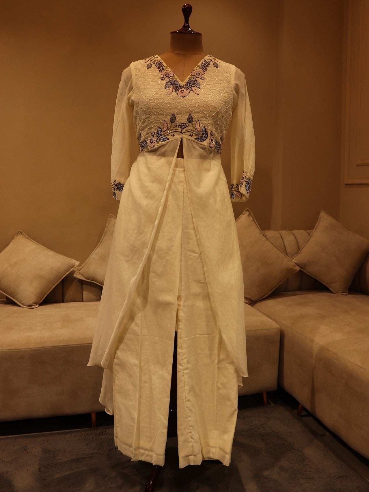 Pearl white flaired top pants and chiffon dupatta JAYAA'S COUTURE Pearl white flaired top pants and chiffon dupatta JAYAA'S COUTURE
