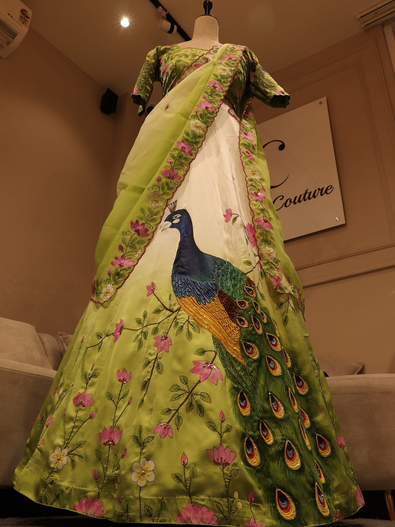 Green off white shaded hand painted peacock lehenga set