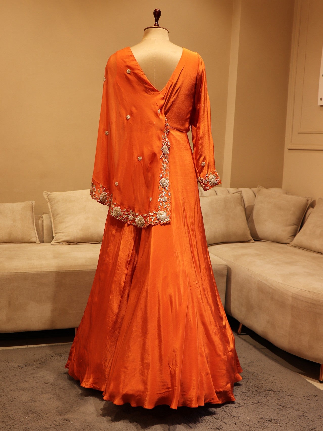 Rust orange gown with cape