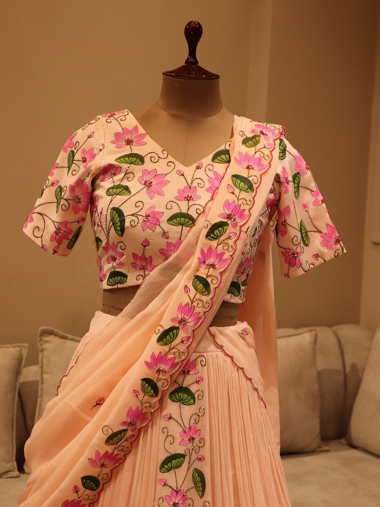 Pastel peach pichwai hand painted lehenga set