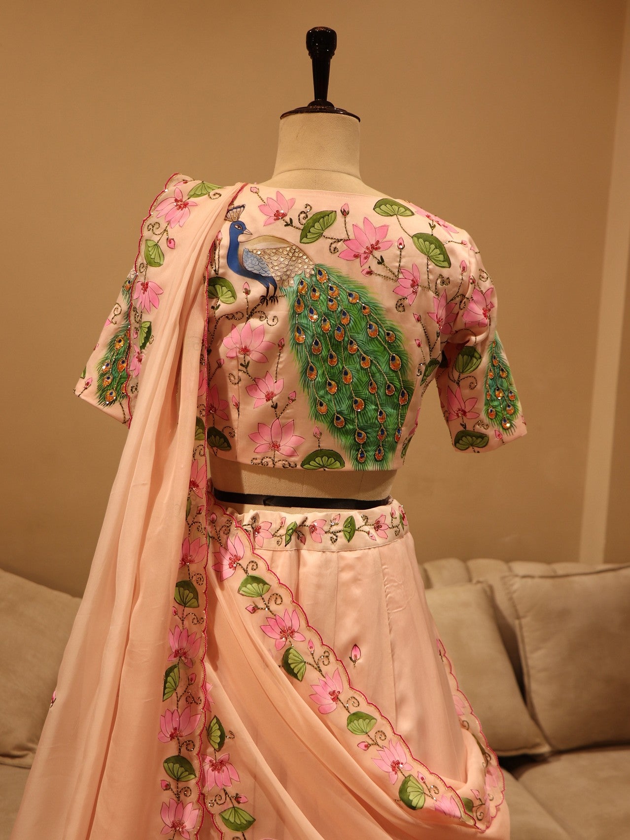 Pastel peach peacock hand painted lehenga set