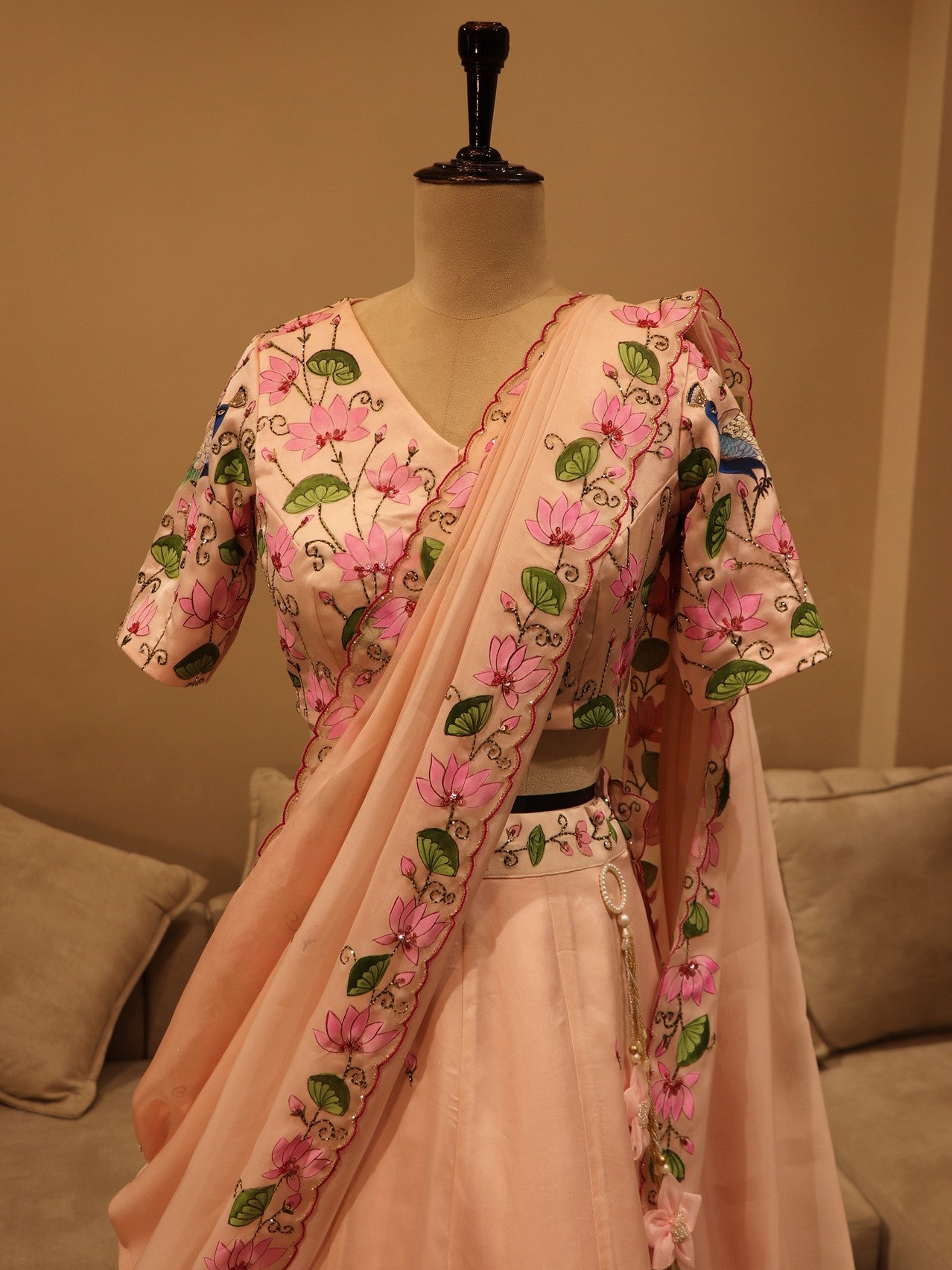 Pastel peach peacock hand painted lehenga set
