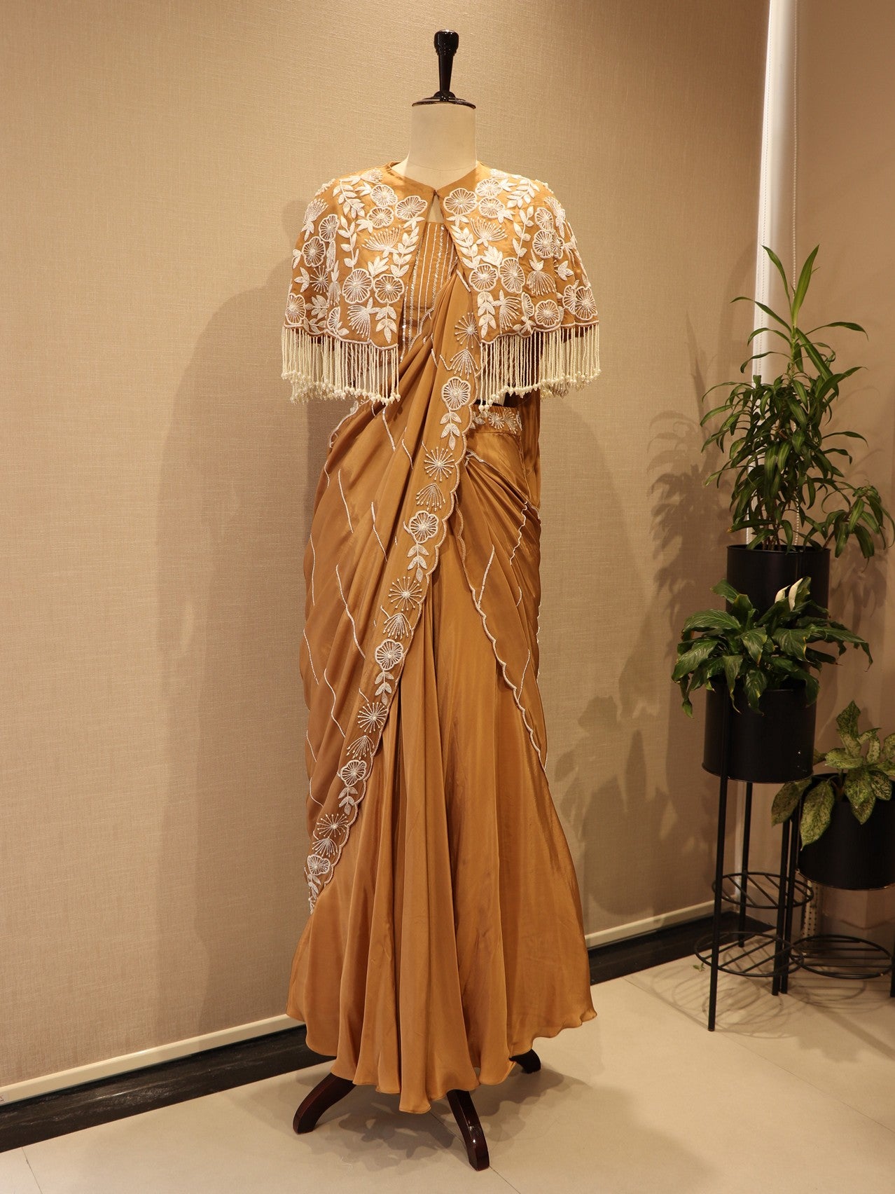 beige drape saree with cape