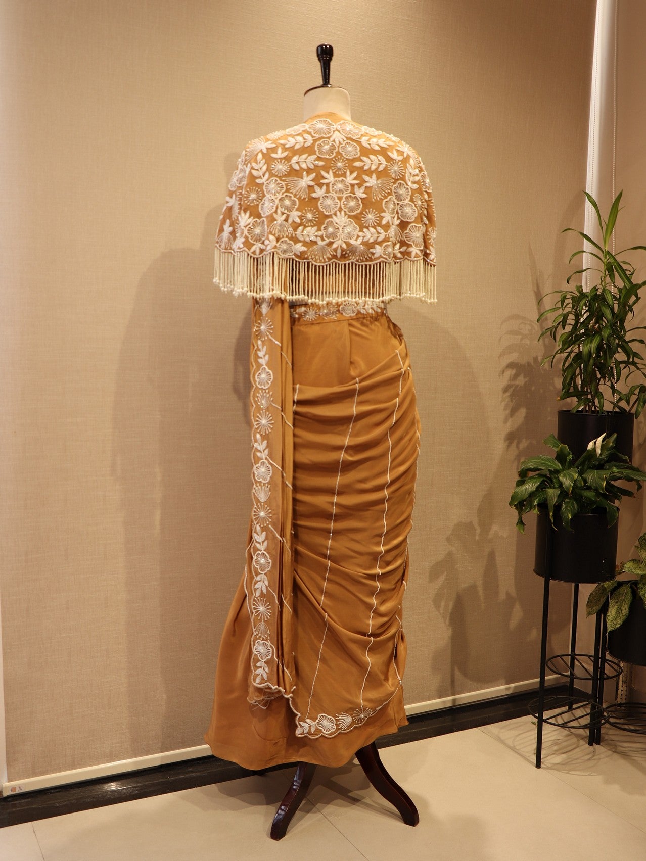 beige drape saree with cape