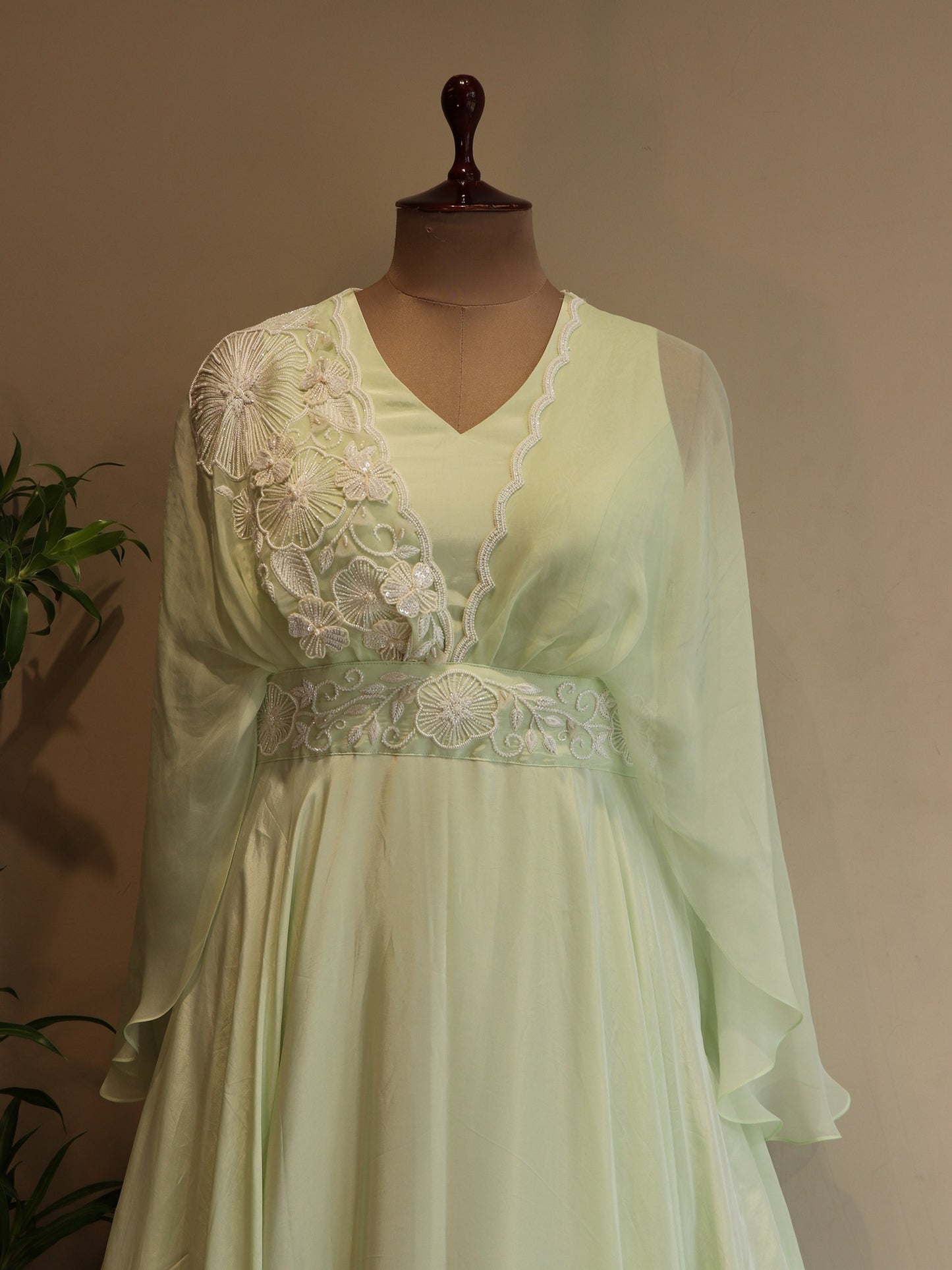 Pastel mint green drape cape gown