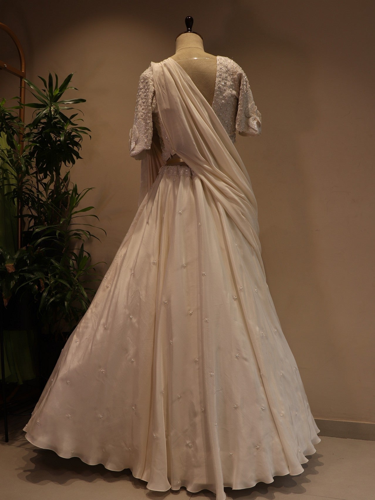 pearl white drape lehenga set