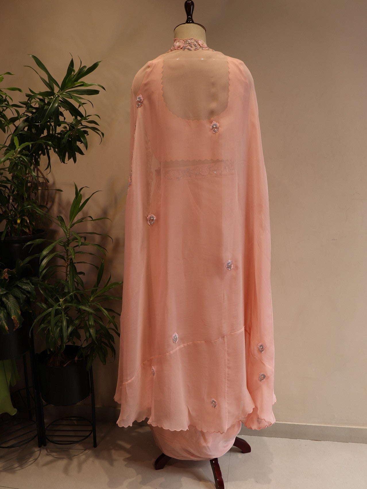 Peachish pink cape with top skirt
