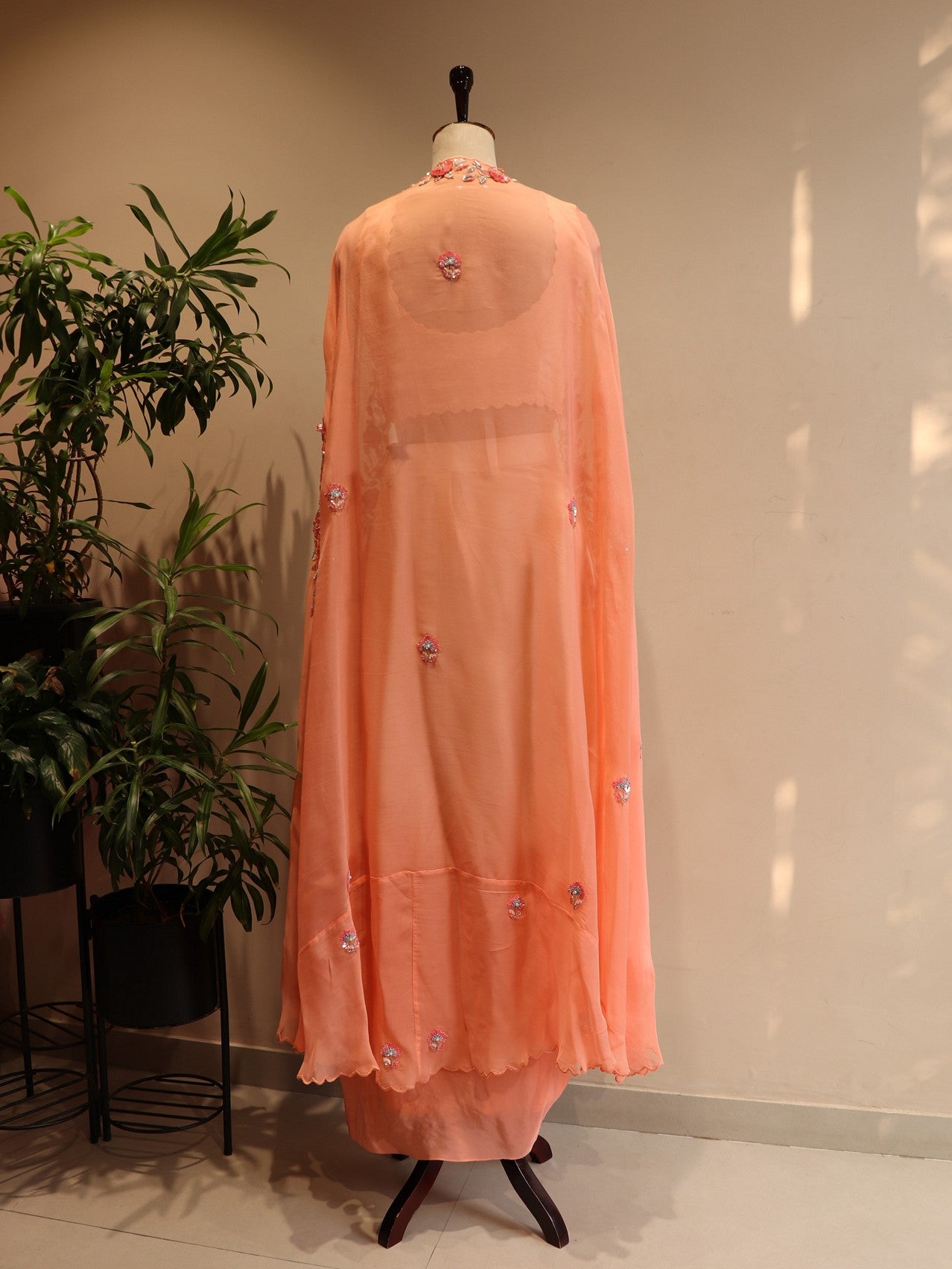 Peach shaded cape top skirt