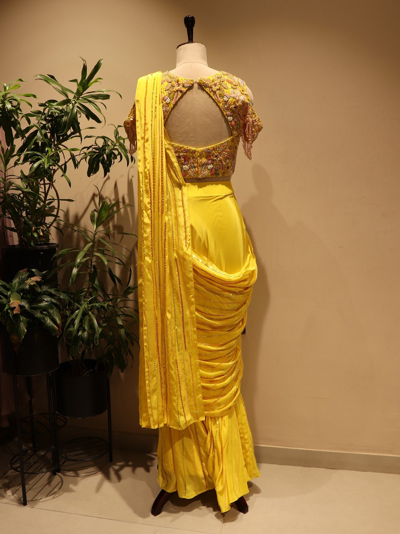 yellow embroidered drape saree