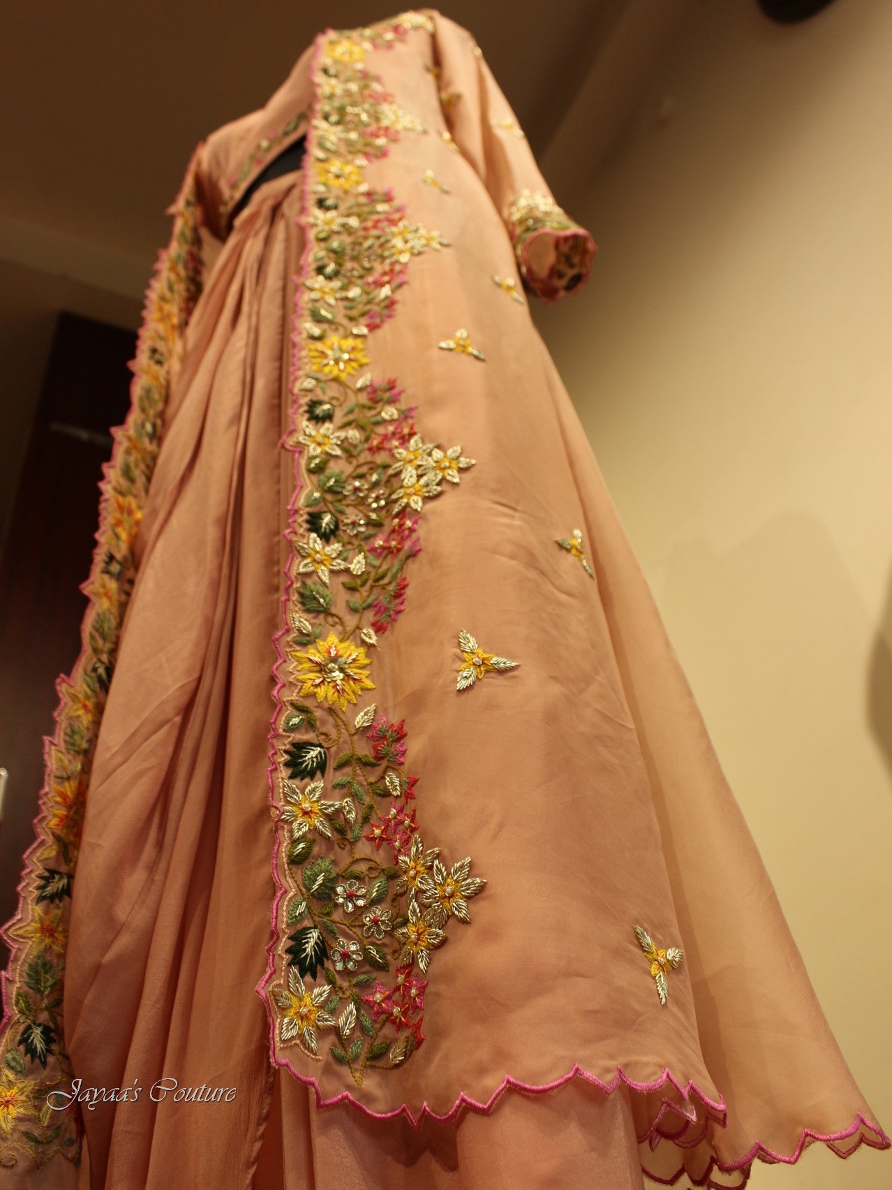 Dusty peach crop top with drape skirt and cape