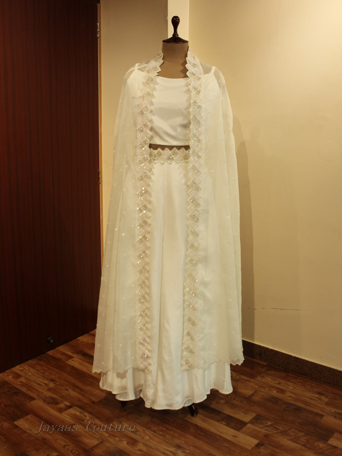 White embroidered cape with crop to and skirt
