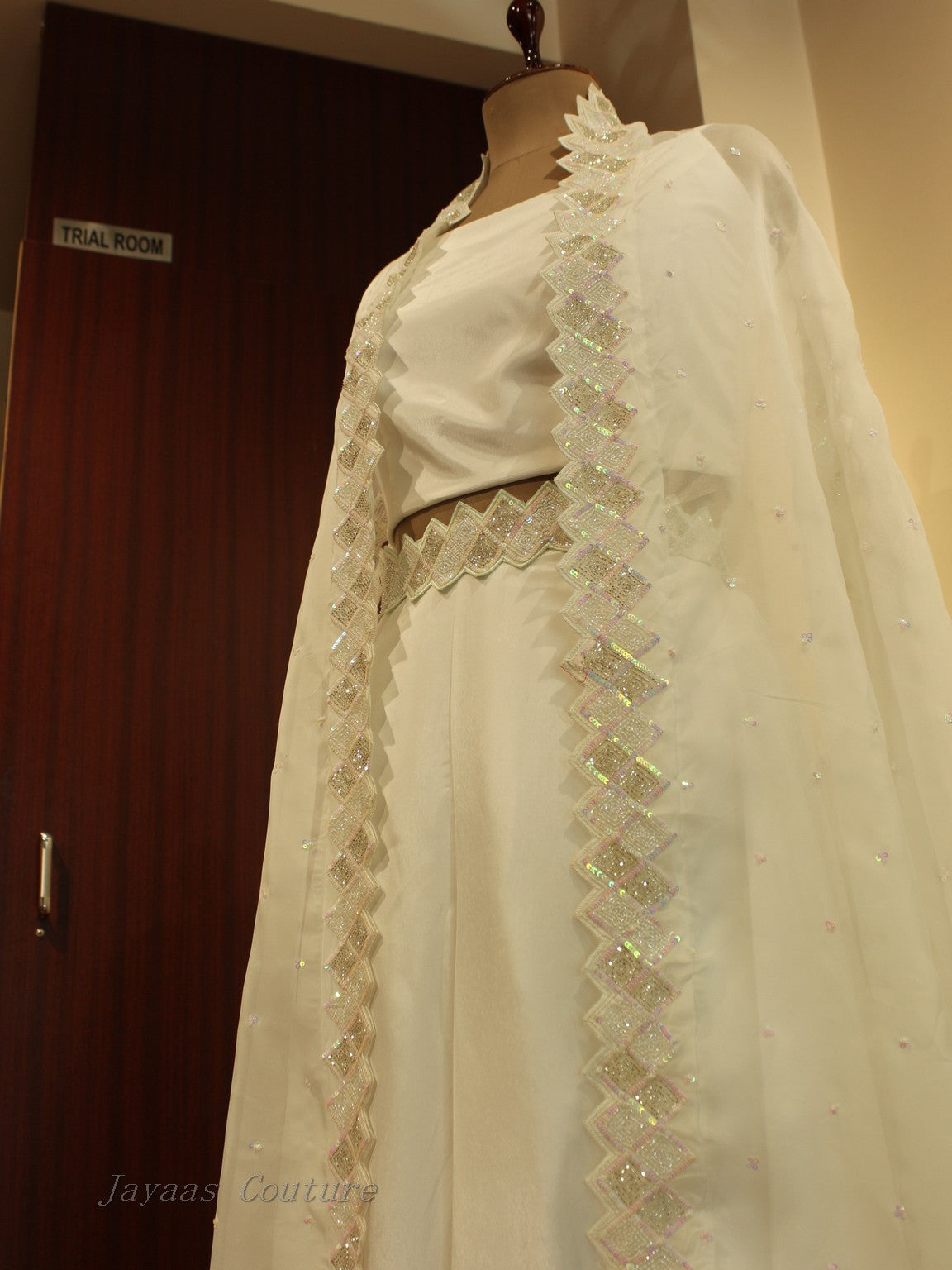 White embroidered cape with crop to and skirt