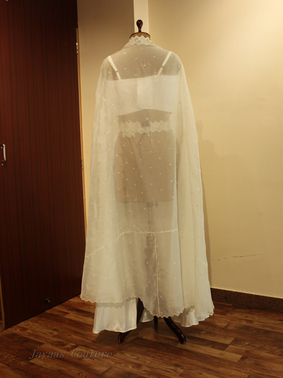 White embroidered cape with crop to and skirt
