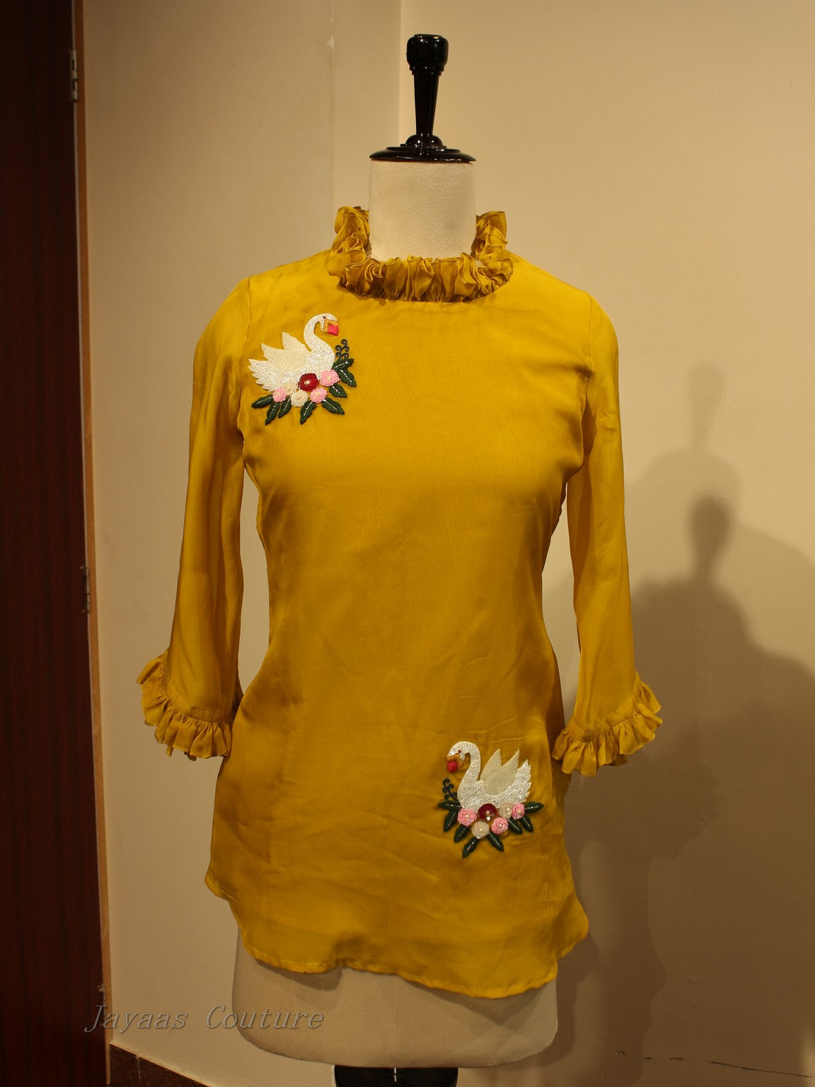 Yellow embroidered top