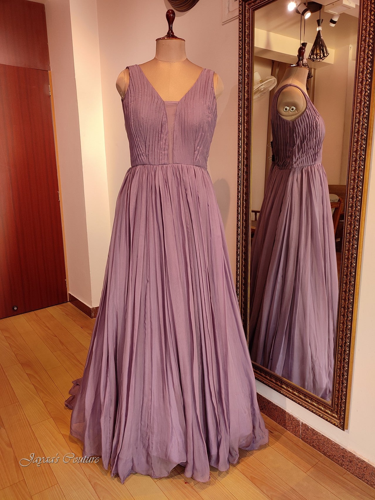 Mauve pleated gown with belt