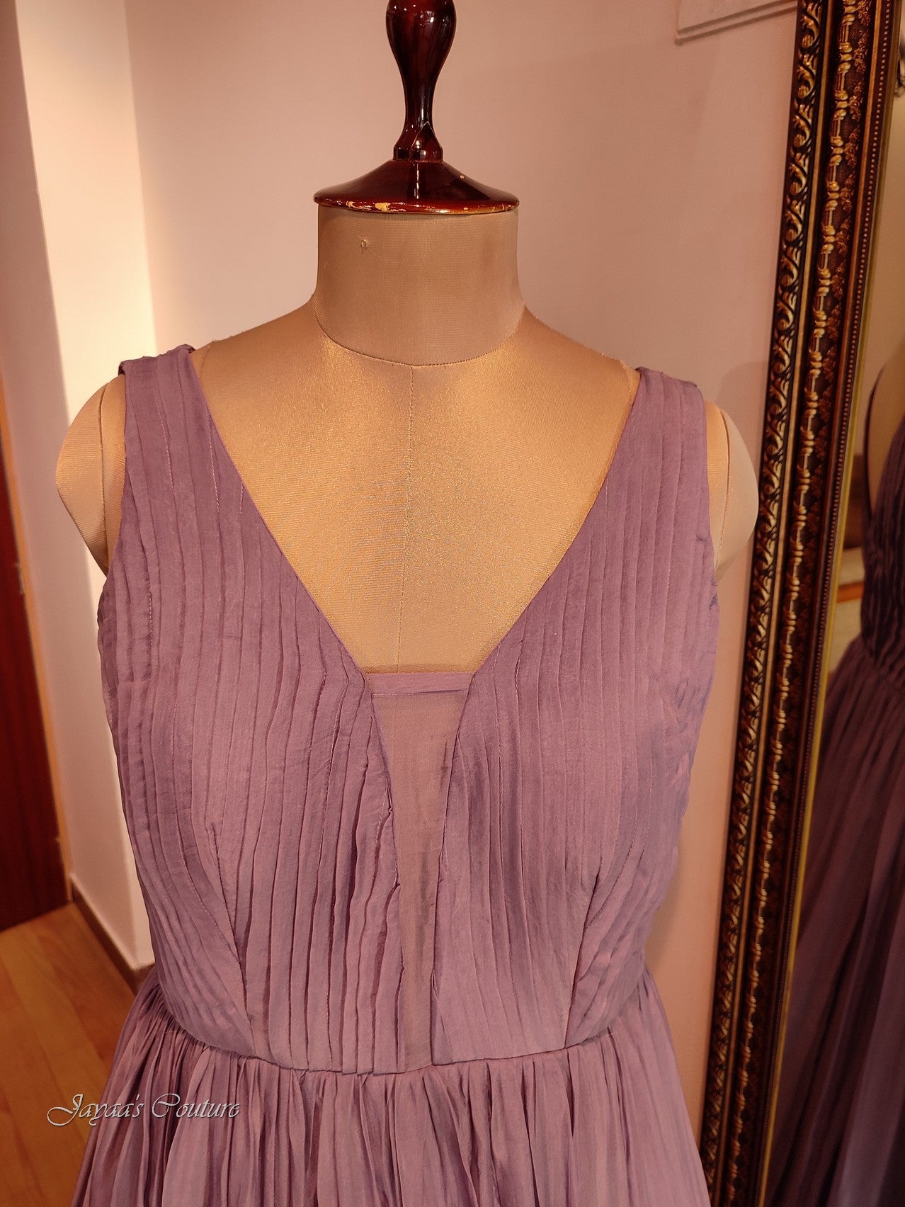 Mauve pleated gown with belt