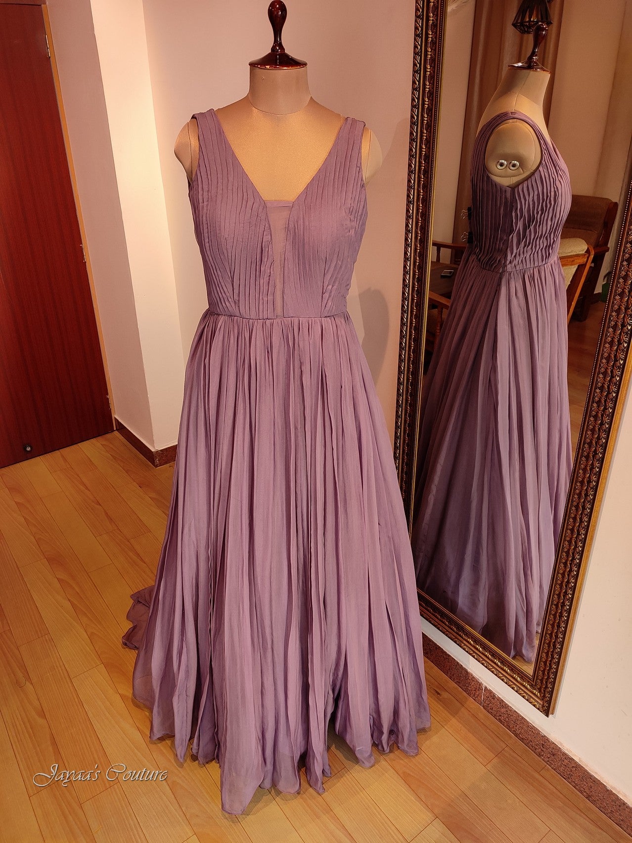 Mauve pleated gown with belt