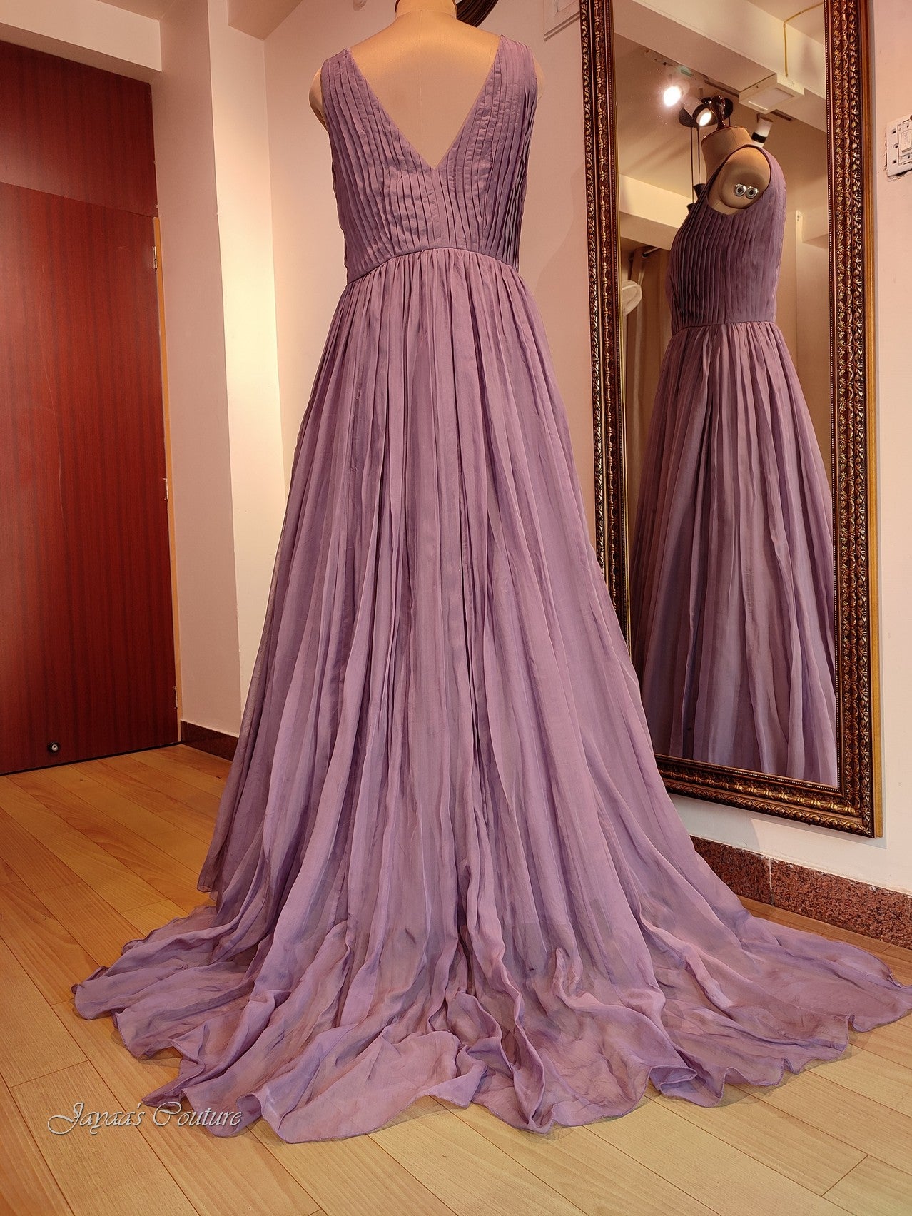 Mauve pleated gown with belt