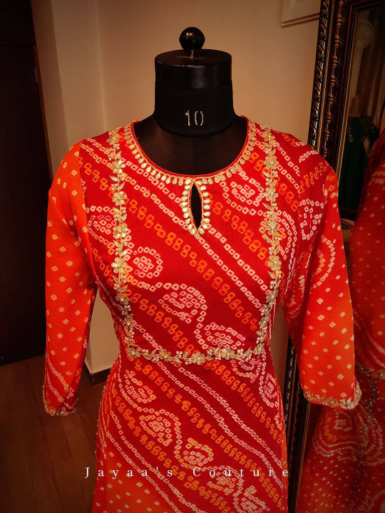 Maroon Orange shaded Bandej Gown Adorned with Gotta Patti Handwork