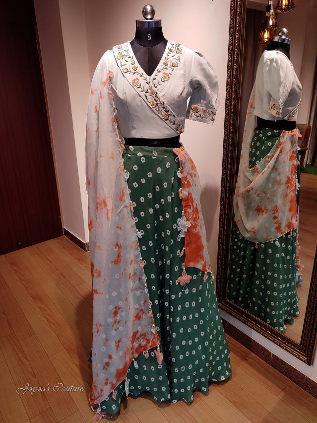 Dark Green bandhani skirt with pastel green blouse & tie & dye dupatta