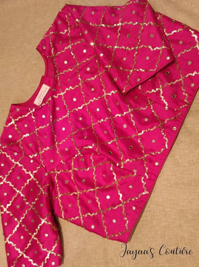 Bottle green lehenga with hot pink blouse and bandhani dupatta