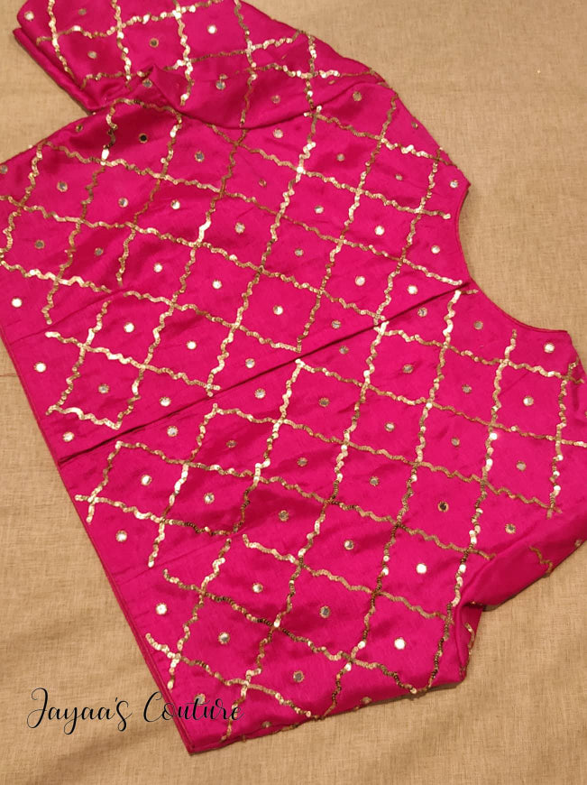Bottle green lehenga with hot pink blouse and bandhani dupatta