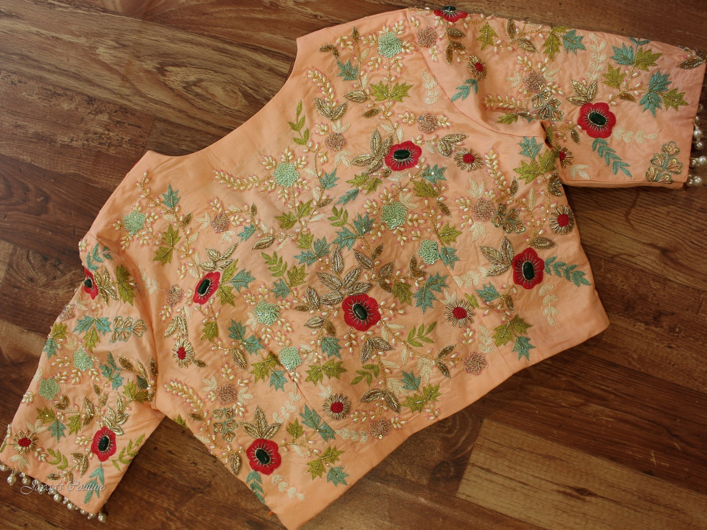 Sea green saree with heavy peach blouse