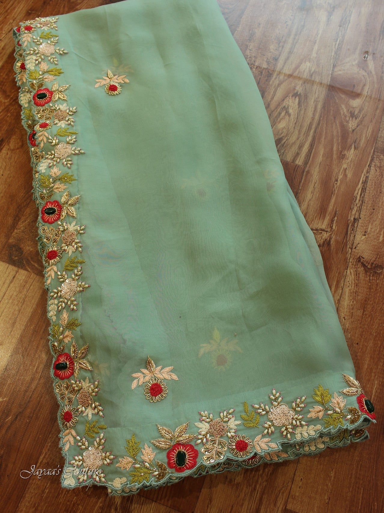 Sea green saree with heavy peach blouse