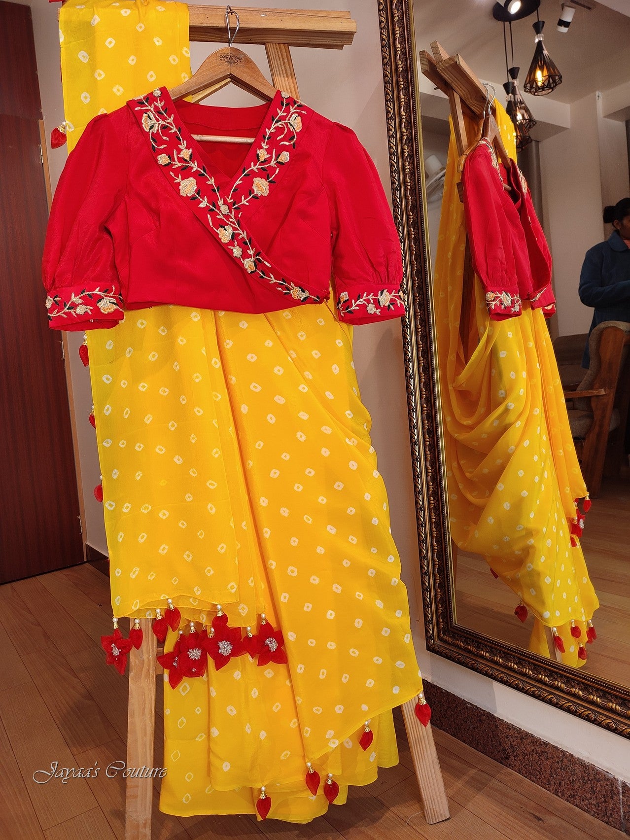 Yellow bandhej saree with rani blouse