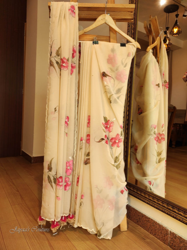 Off white hand painted saree with unstiched blouse