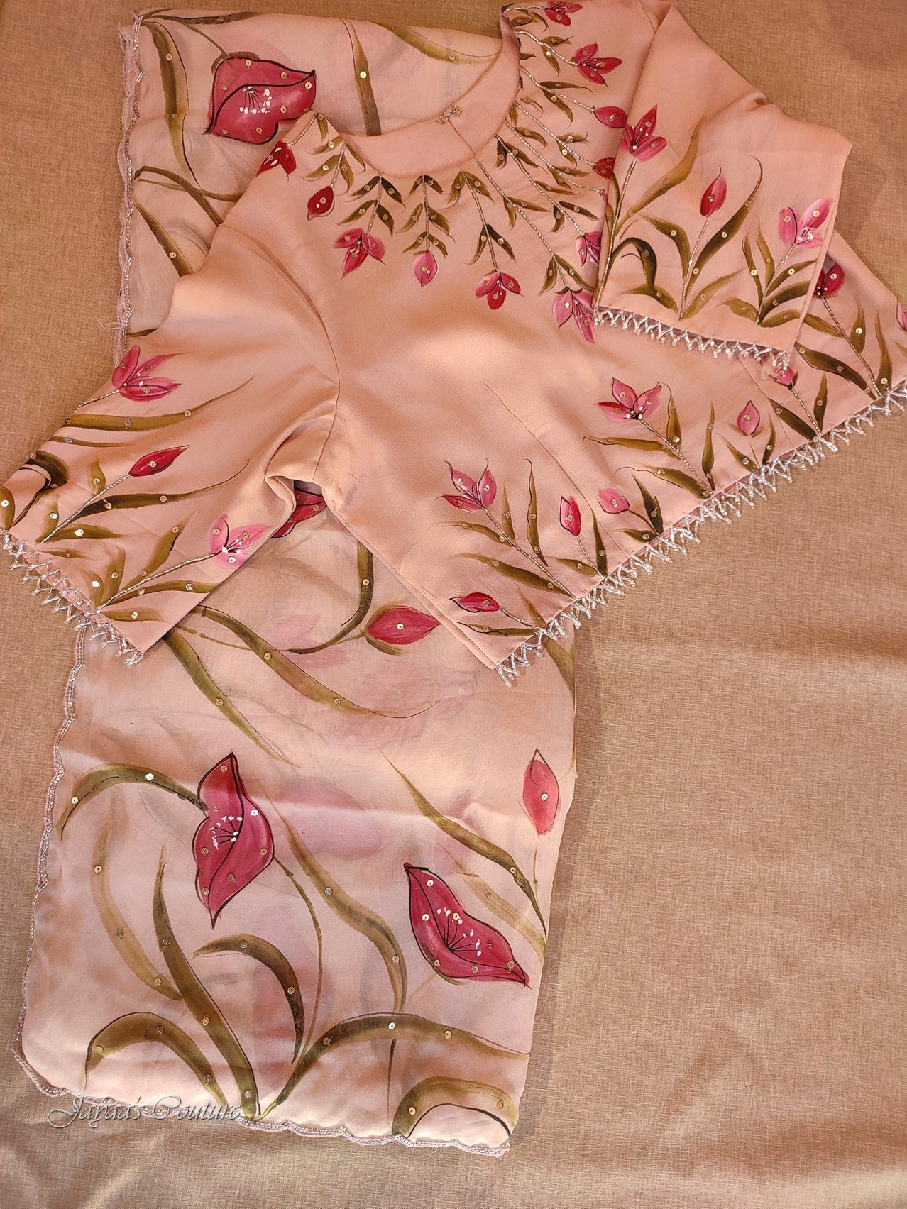 Dusty peach hand painted saree with blouse