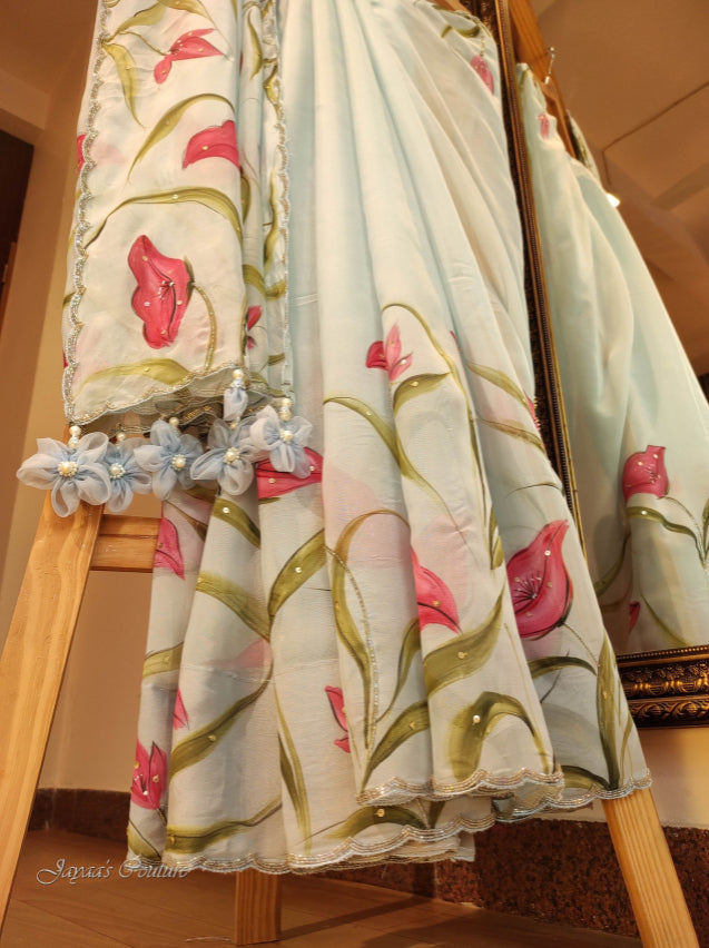 Powder blue hand painted saree with blouse