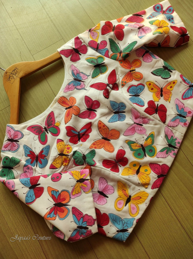 Red & pink saree with off white hand painted blouse