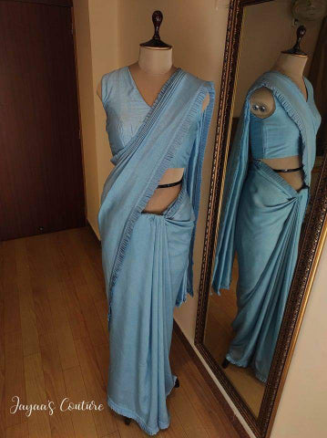 Powder blue saree blouse and shrug