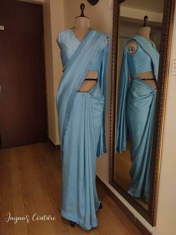 Powder blue saree blouse and shrug