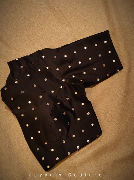 Red saree with black mirror work blouse