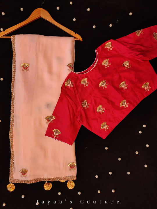 Peach gota work saree with tomato red blouse