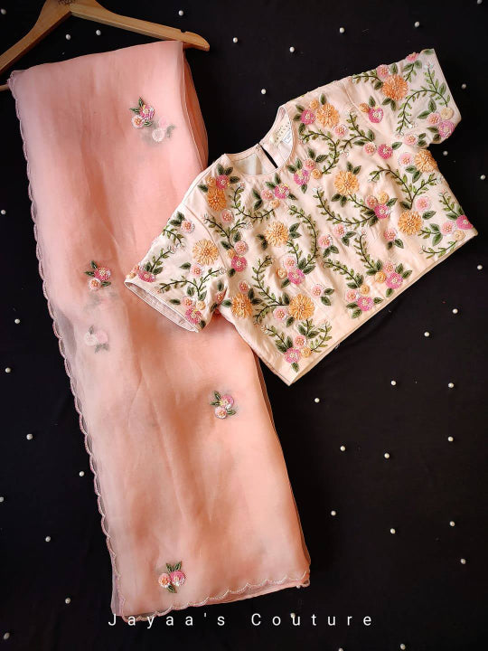 PEACH ORGANZA SAREE & CREPE BLOUSE ADORNED WITH HAND WORK