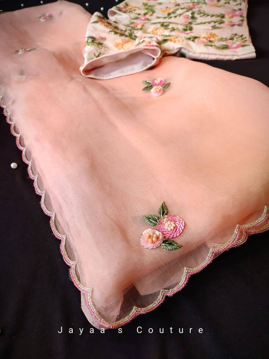 PEACH ORGANZA SAREE & CREPE BLOUSE ADORNED WITH HAND WORK