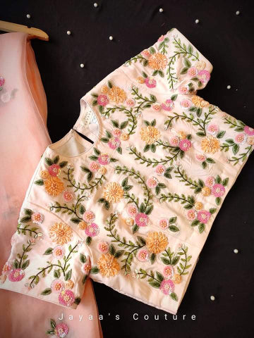 PEACH ORGANZA SAREE & CREPE BLOUSE ADORNED WITH HAND WORK