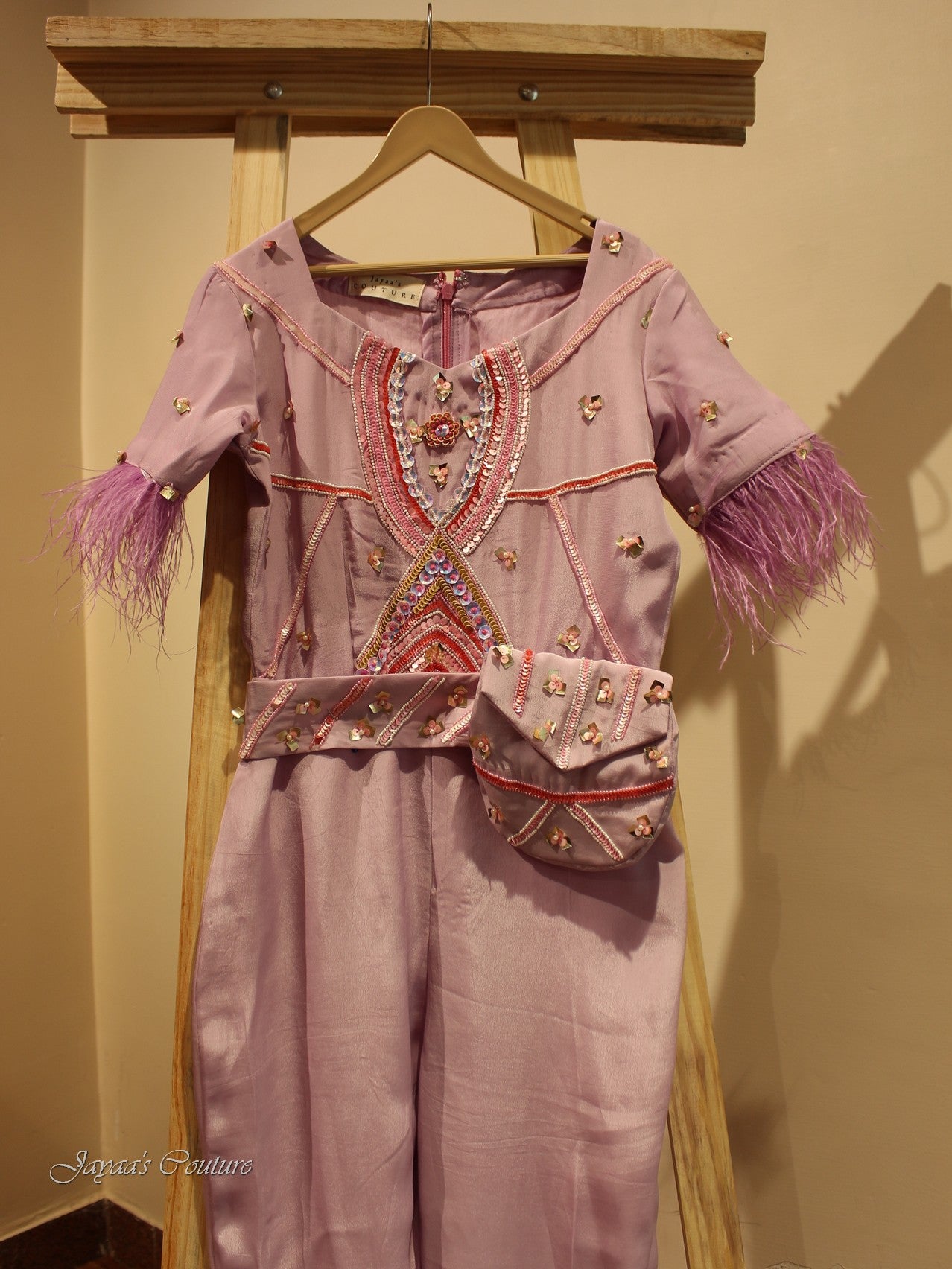 Lavendar jumpsuit with belt pouch