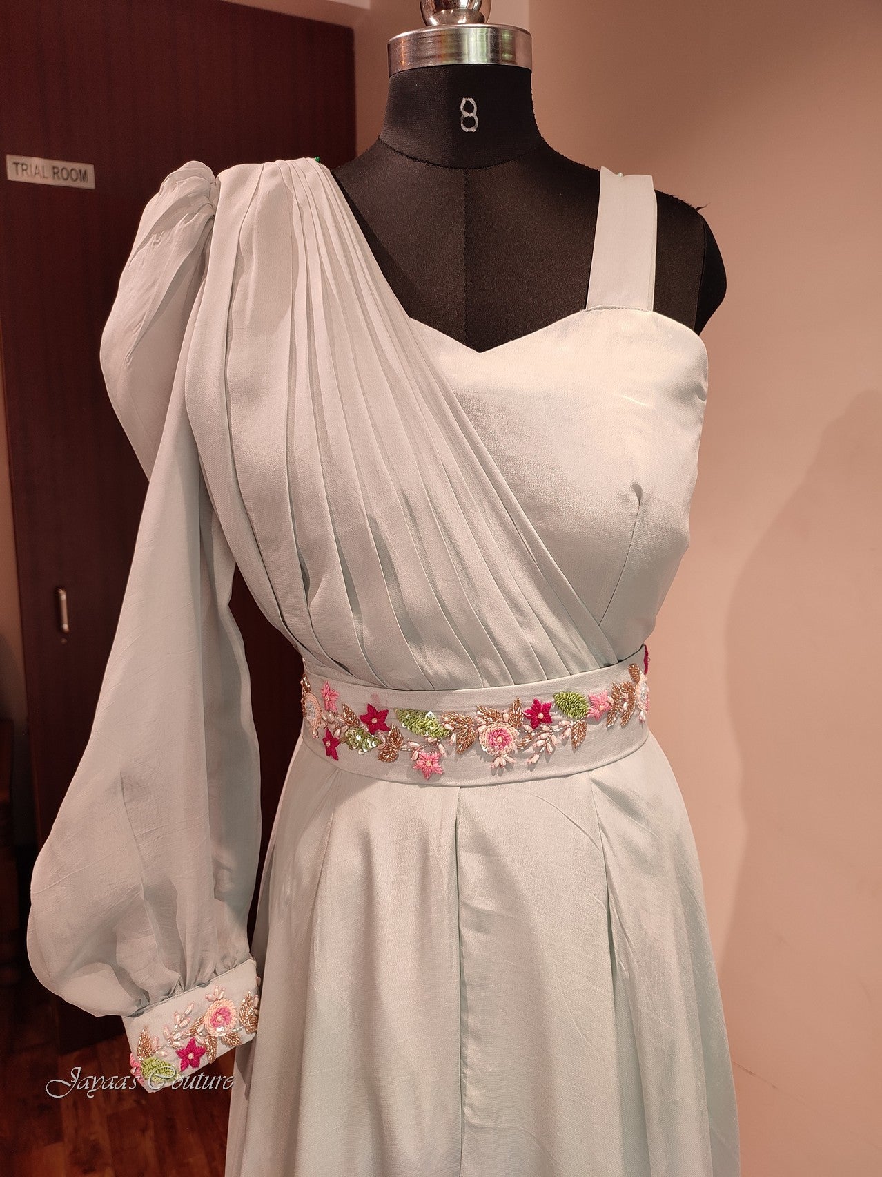Powder blue jumpsuit with belt