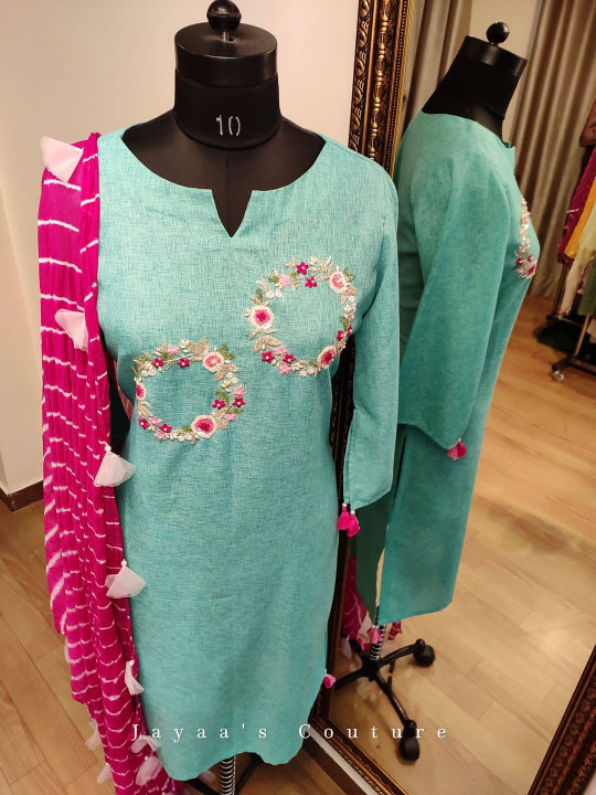 Turquoise Blue kurta pants with leheriya Dupatta.