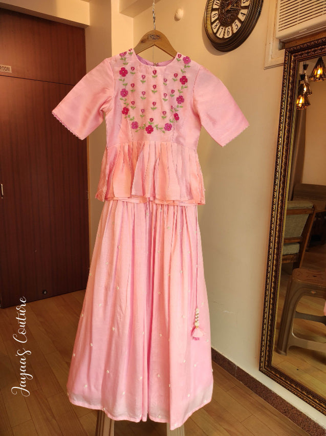 Peplum top with pleated skirt