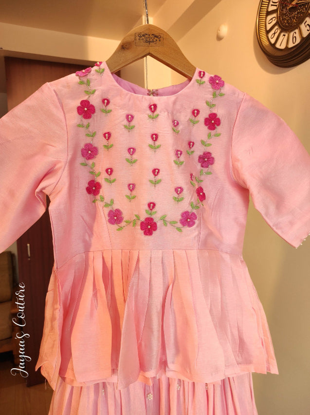 Peplum top with pleated skirt