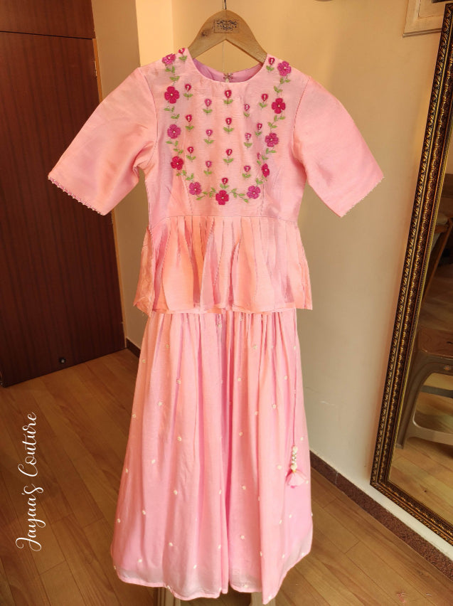Peplum top with pleated skirt