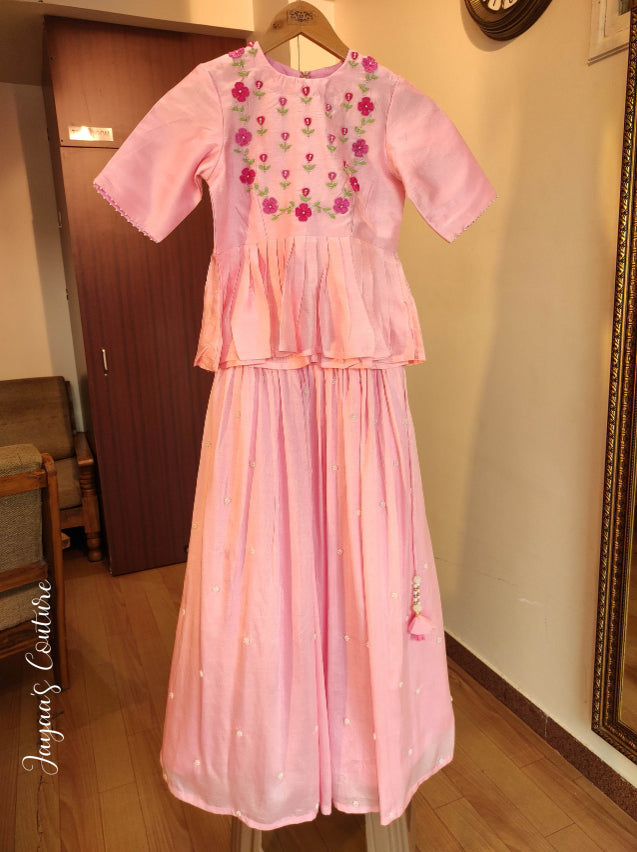 Peplum top with pleated skirt